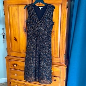 A summertime twist on the classic “little black dress.” Coldwater Creek, sz 12.